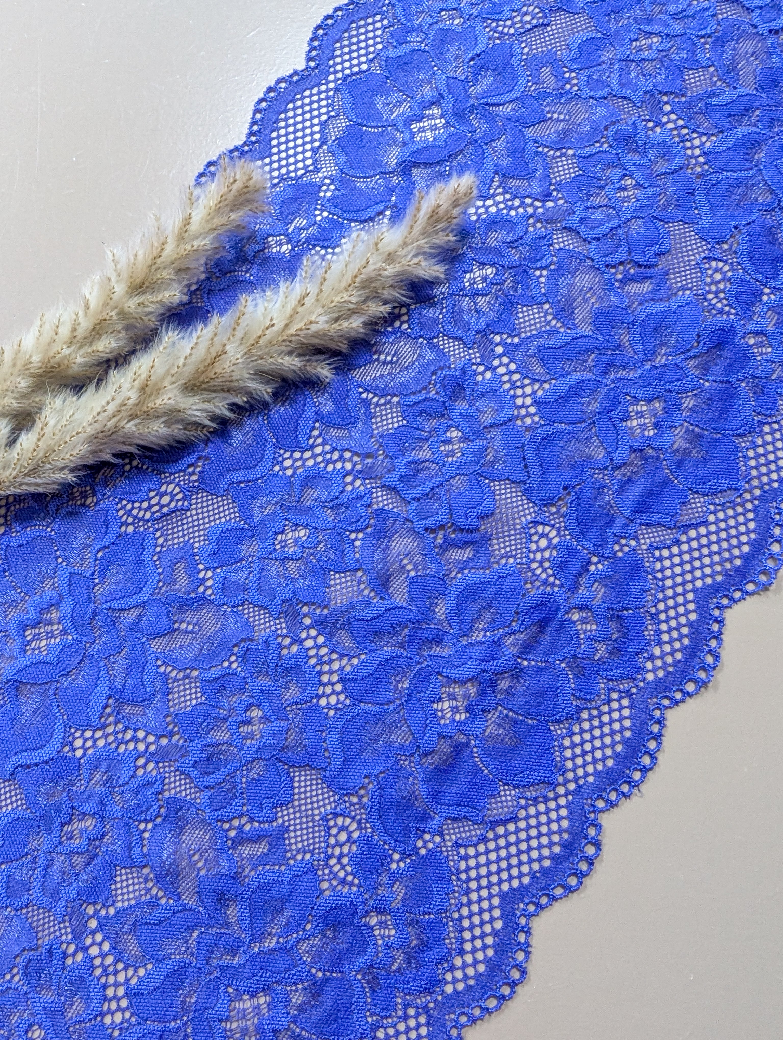 Dentelle stretch fleurie 23 cm - Bleu Mauve