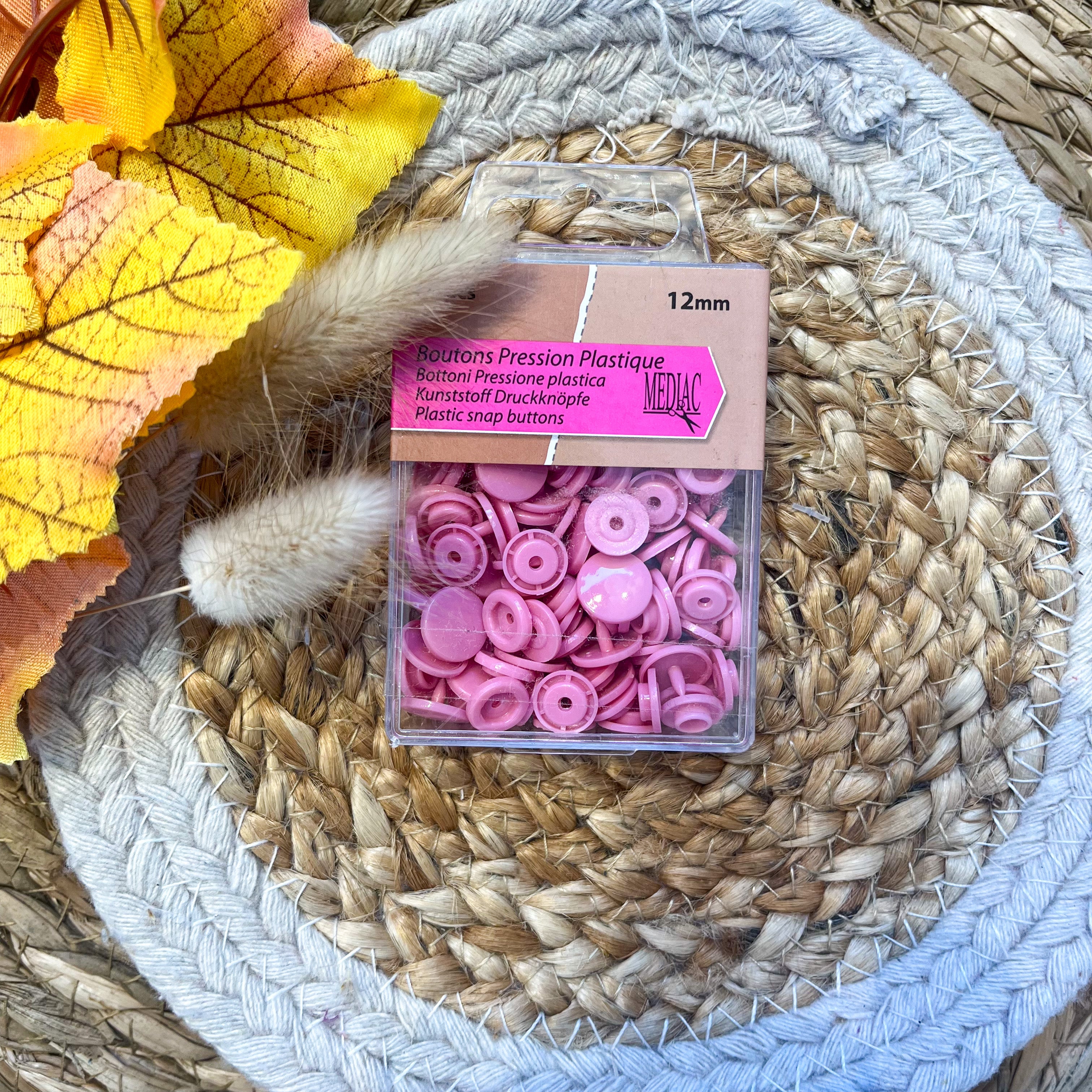 Pressions en plastique - rose