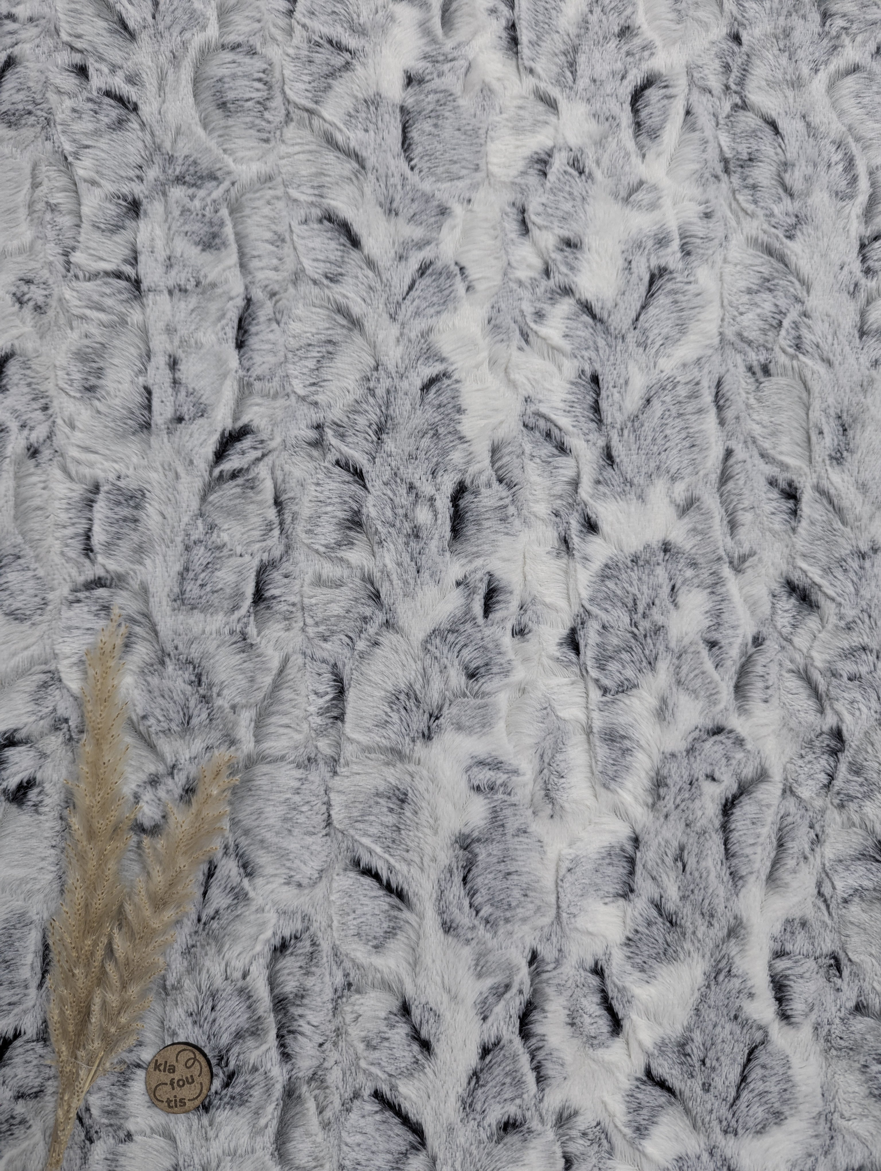 Fausse fourrure effet naturel gris noir