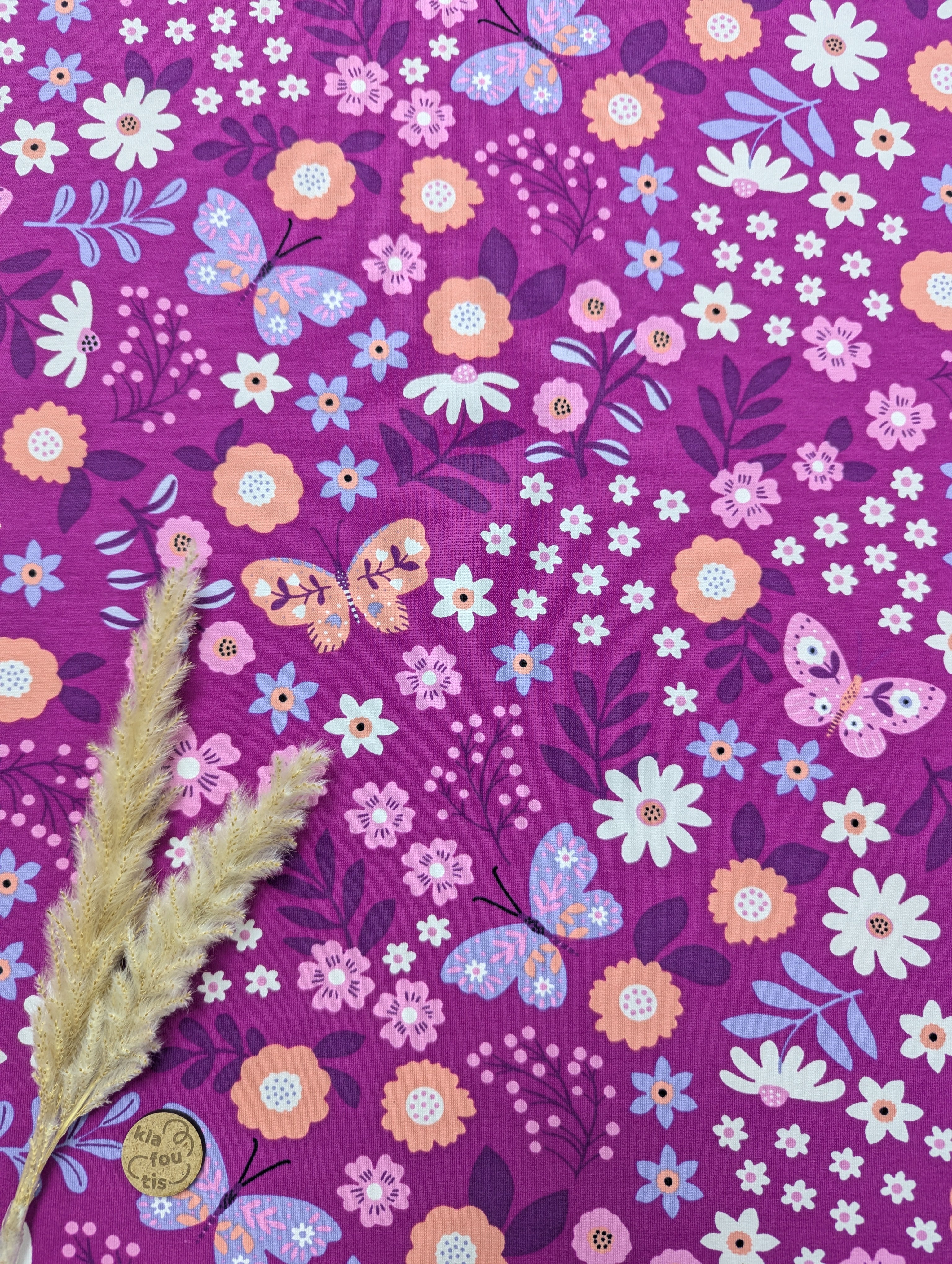 French Terry magenta - floraison de papillons