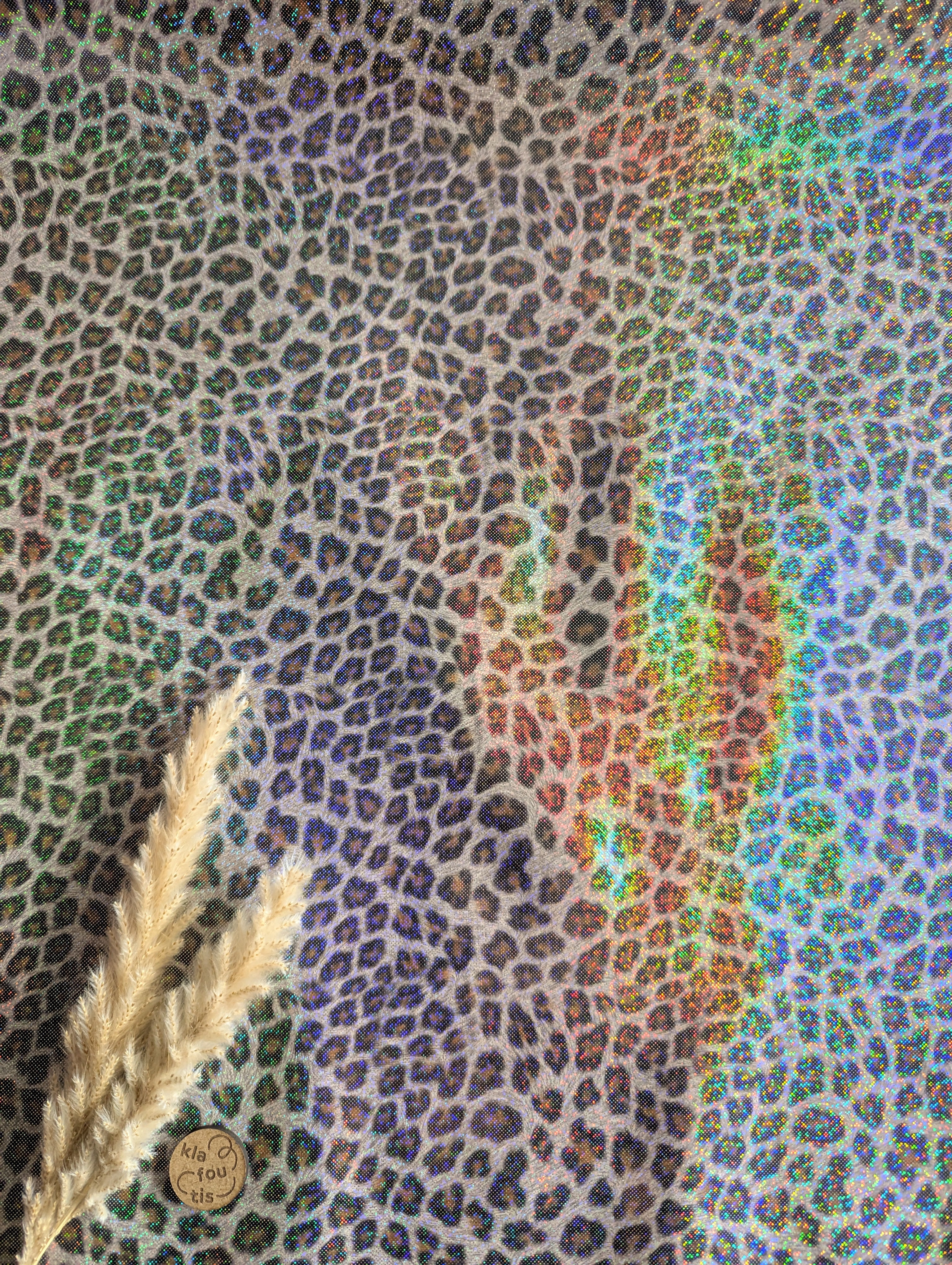 Imperméable doux léopard - ça brille !