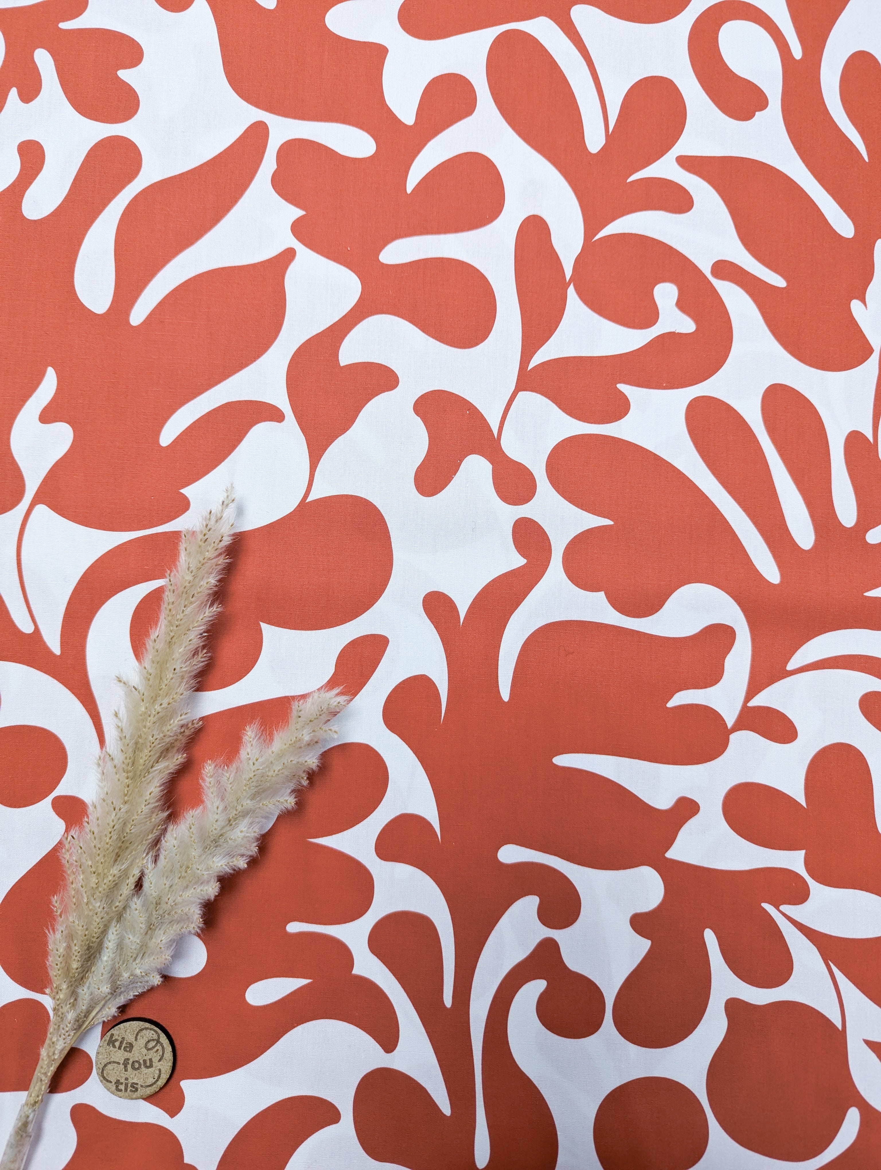 Popeline de coton blanche végétation rouge orangé