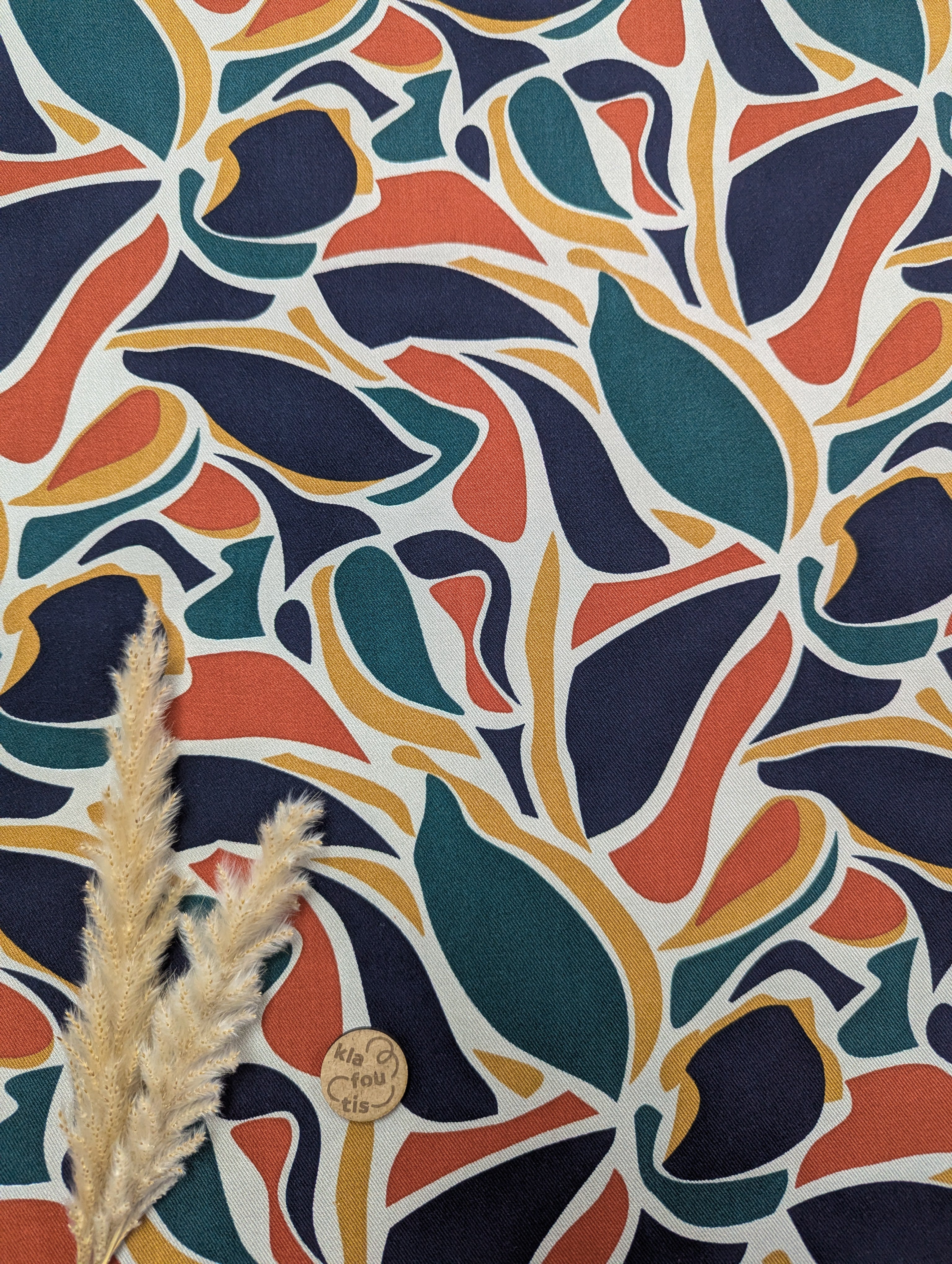 Twill de viscose bleu marine - feuilles abstraites