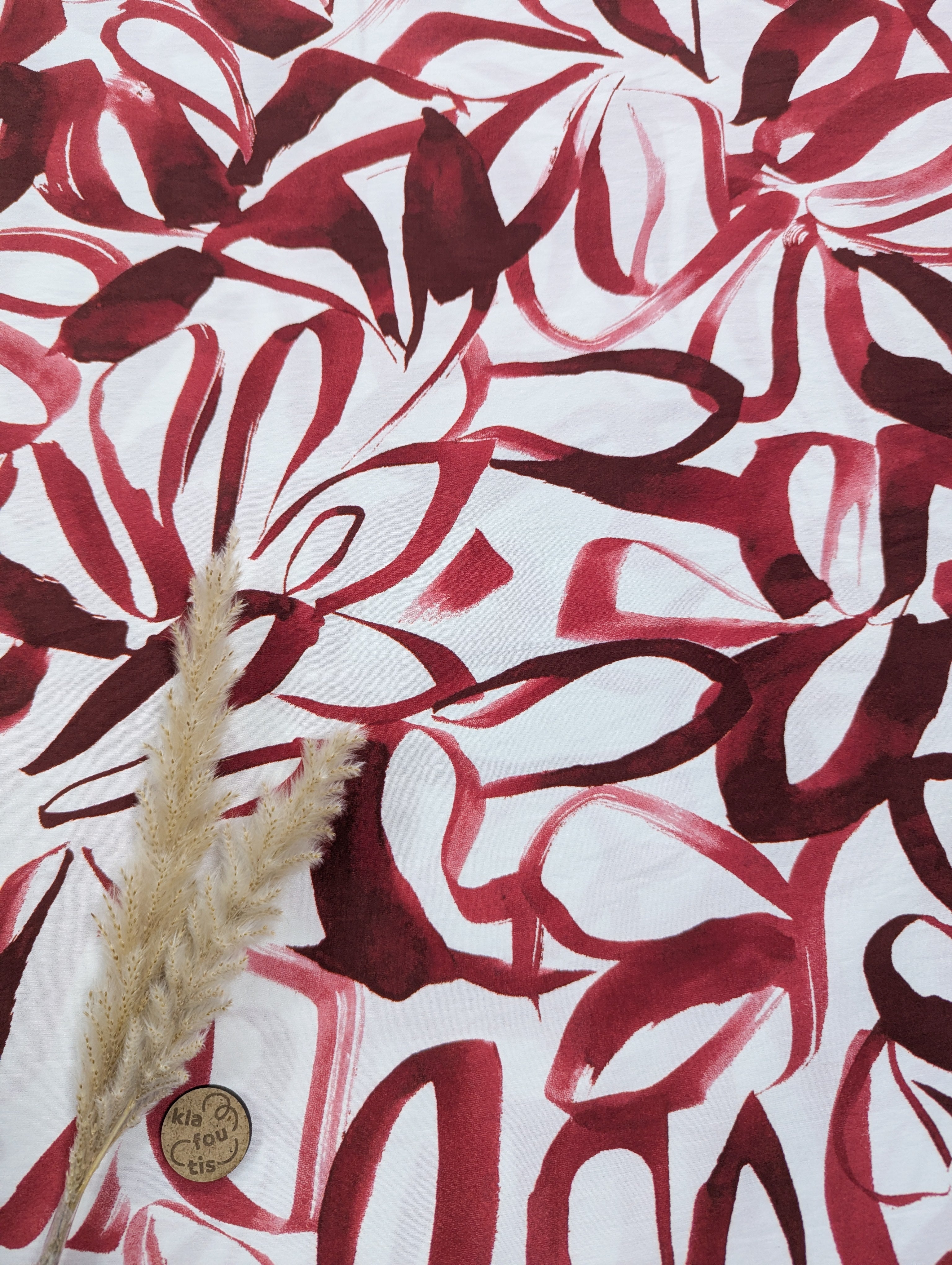 Popeline de viscose écru - traits fleuris rouges