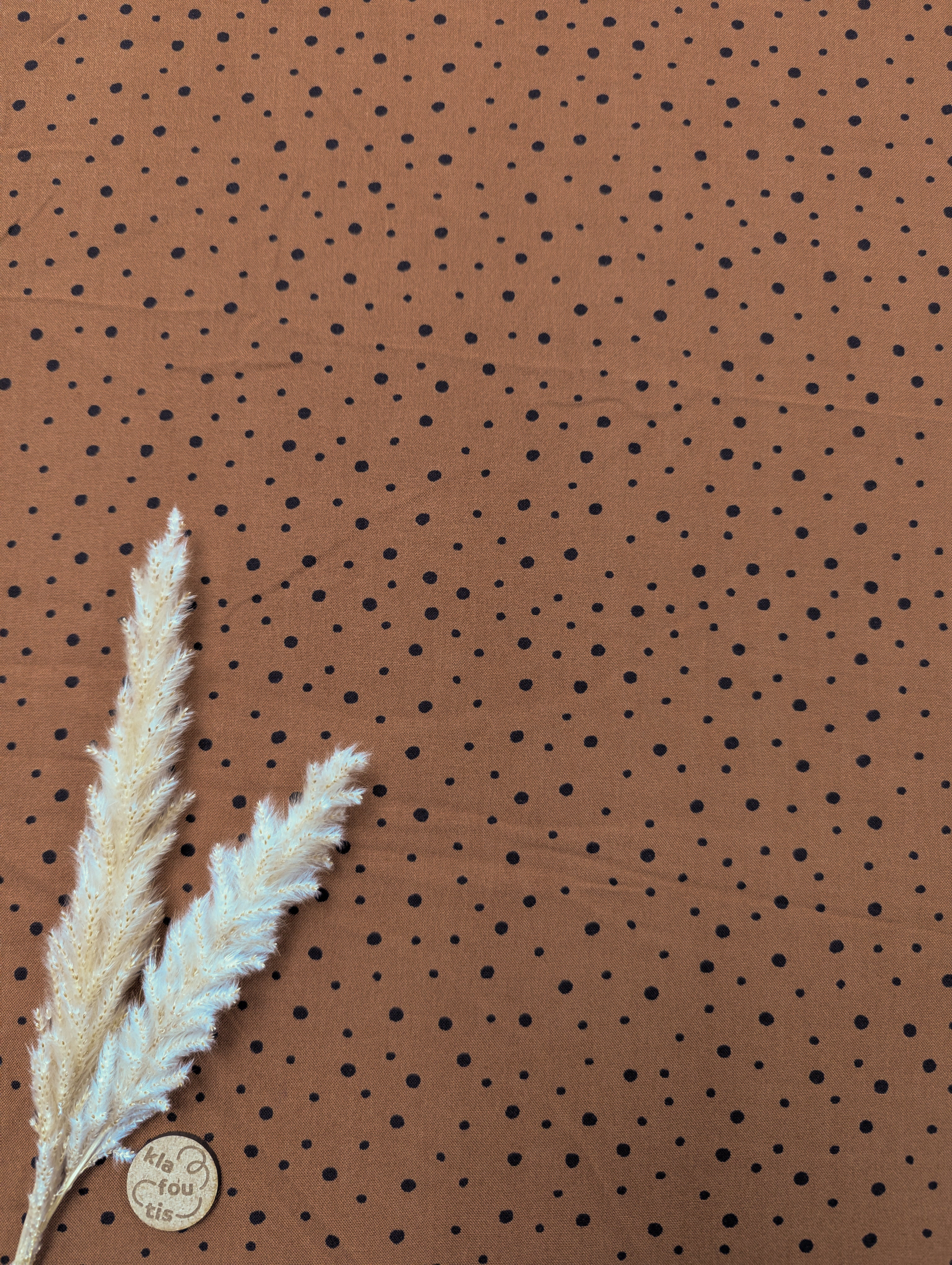 Popeline de viscose brique à pois noirs