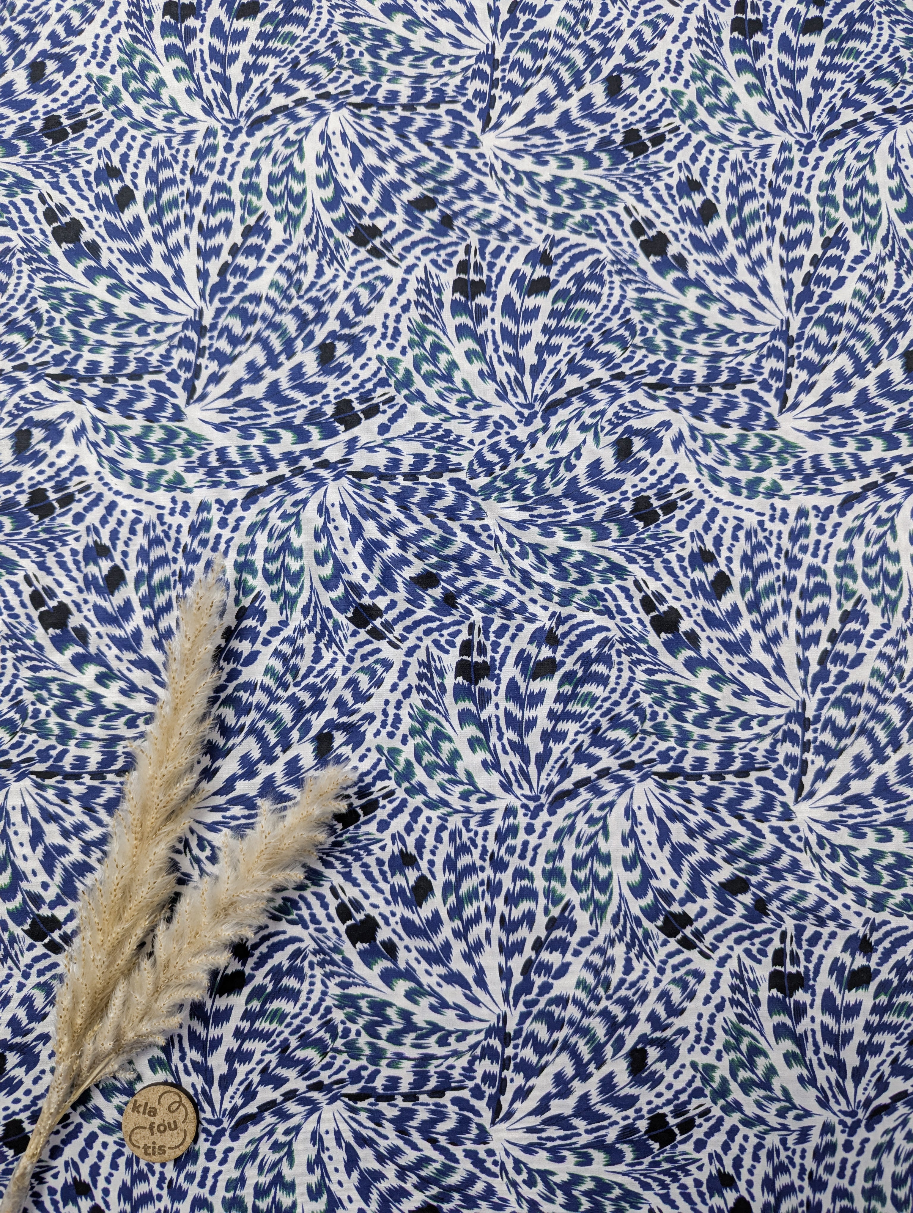 Popeline de coton bleu - feuilles de plume
