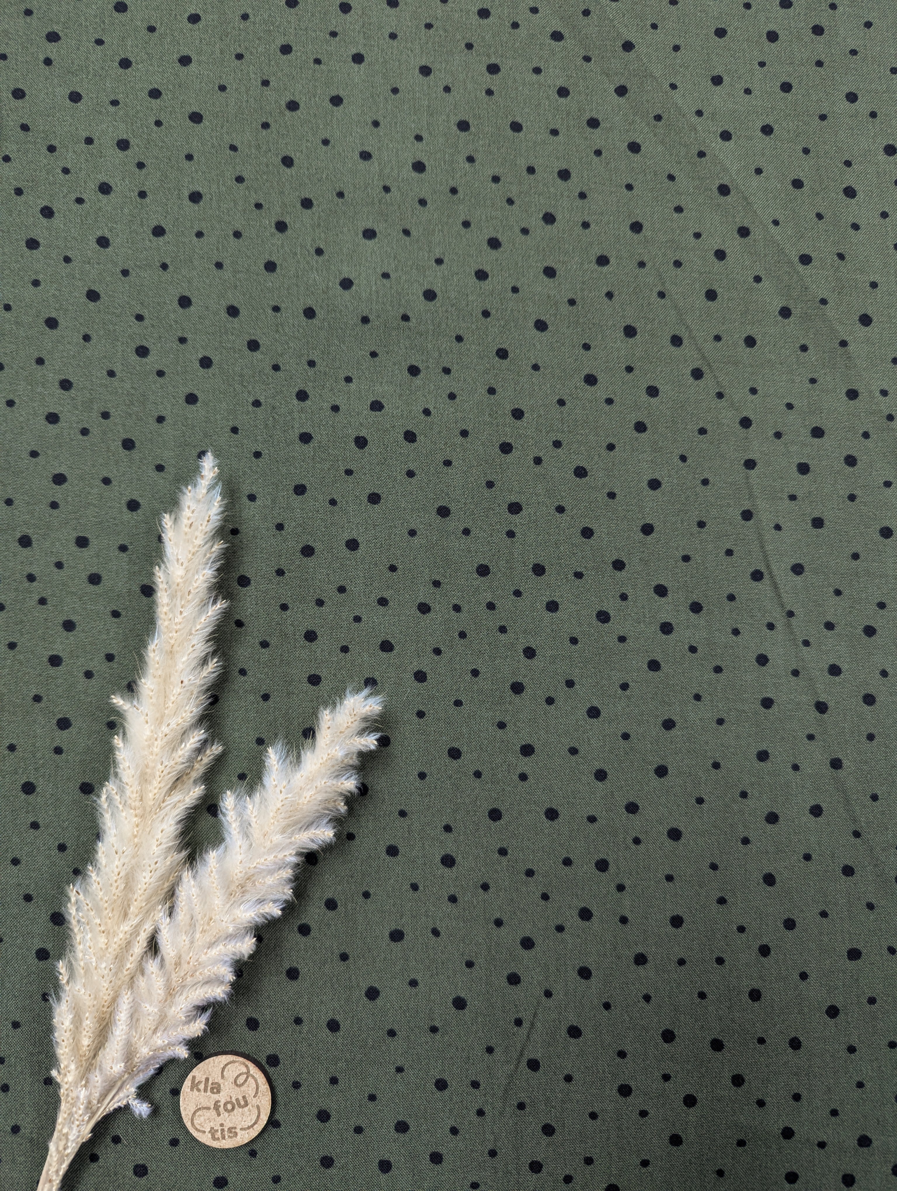 Popeline de viscose vert kaki à pois noirs