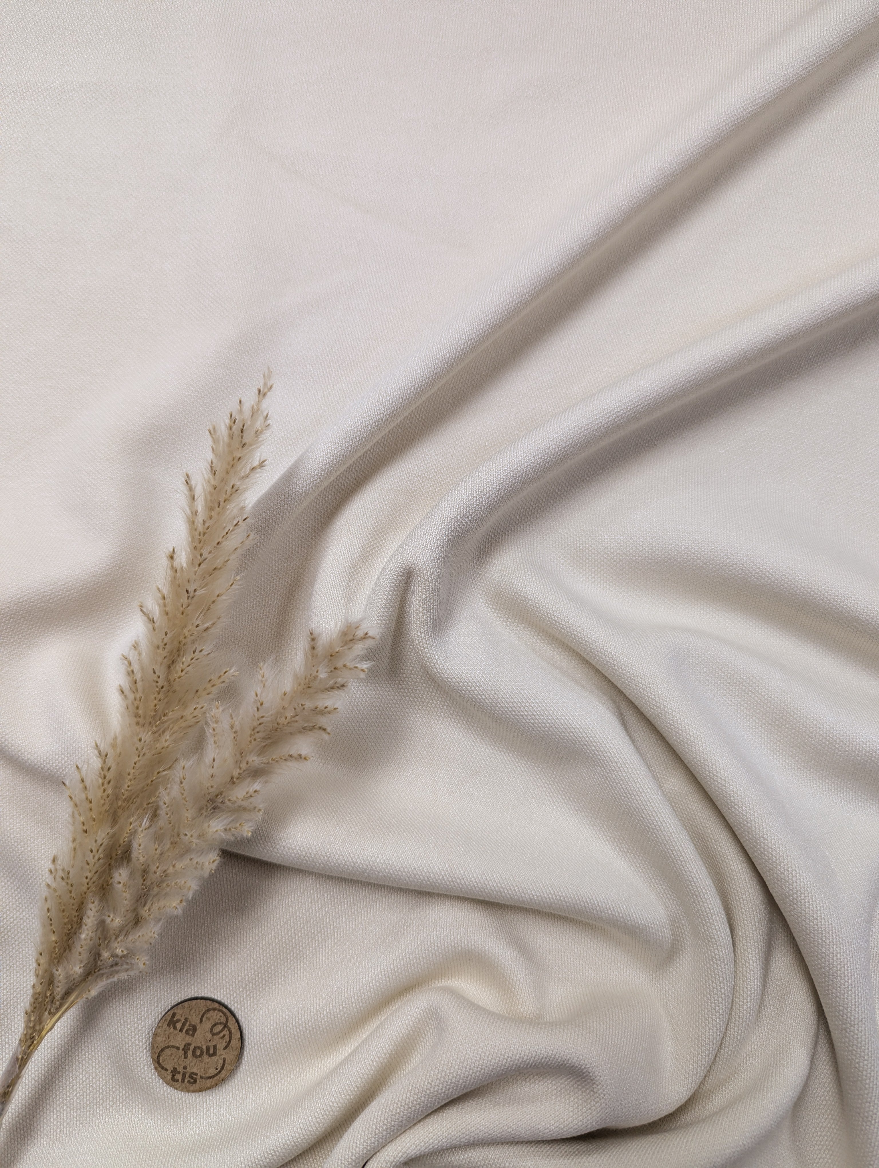 Maille épaisse fluide - effet piqué - crème