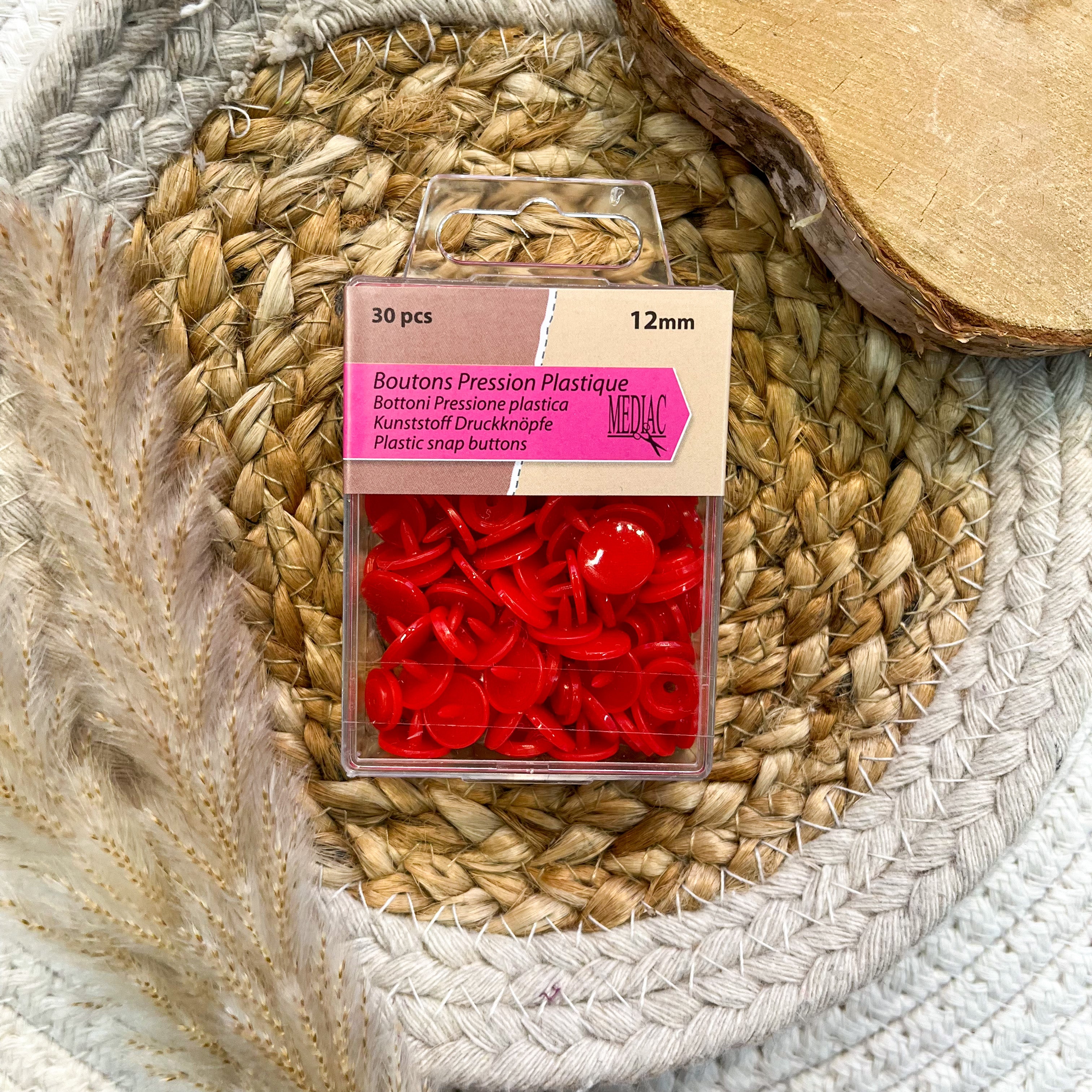 Pressions en plastique - rouge